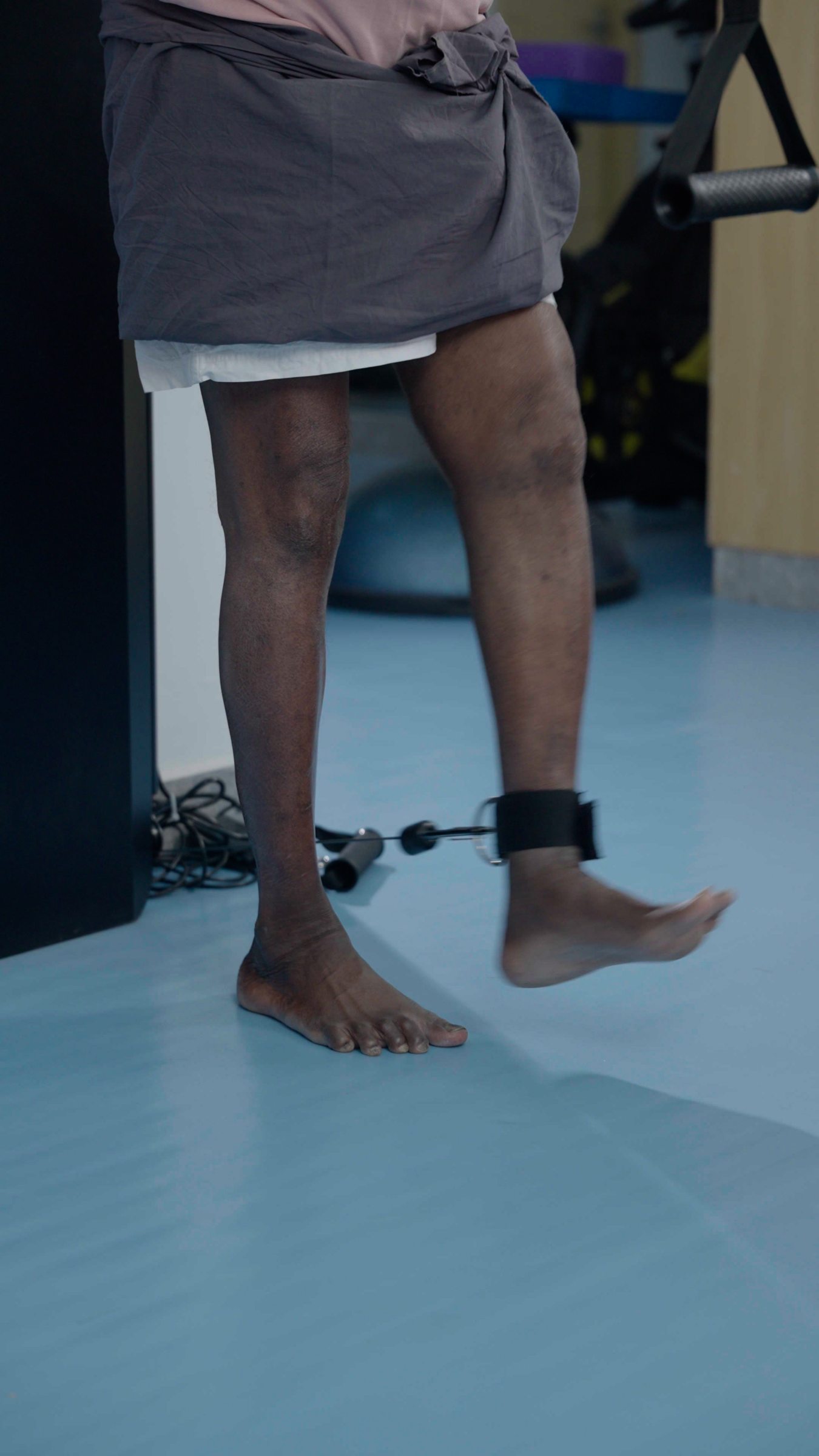 Close-up of a leg exercise with the Aroleap ankle strap